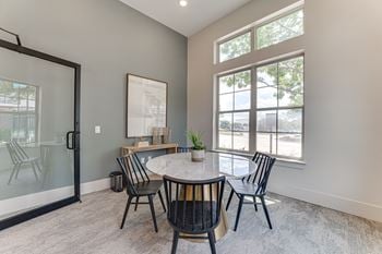 Modern dining room with a glass door